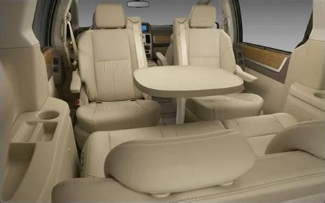 Minivan With Table And Swivel Seats | Brokeasshome.com