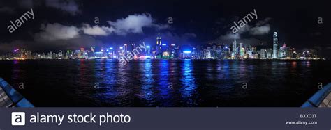 Hong Kong waterfront panorama at night, across Victoria Harbour from ...