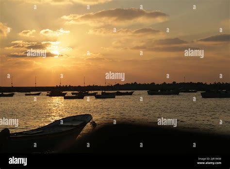 Gaza, Palestine Sunset scene with fishermen's boats from Gaza sea port Stock Photo - Alamy