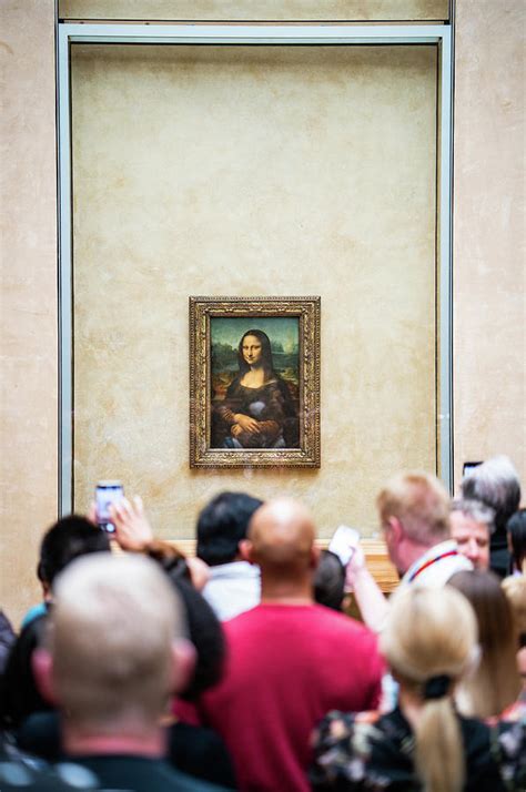 Mona Lisa portrait in Louvre museum in Paris, France. Photograph by Kristian Sekulic - Pixels