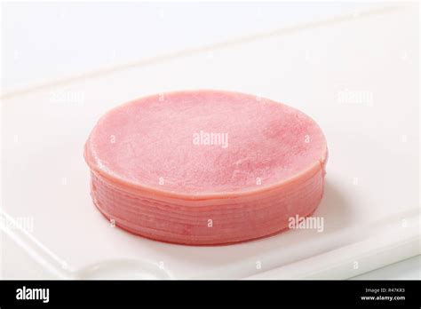 Thin slices of ham Stock Photo - Alamy