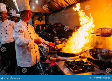 Chef Cooking Chinese Food with Burning Fire on Steel Pan Editorial ...