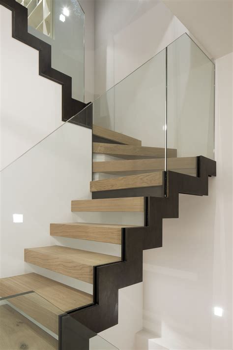 Zig zag stair, bronze stringer, oak treads, glass balustrade www.peekarchitecture.co.uk ...