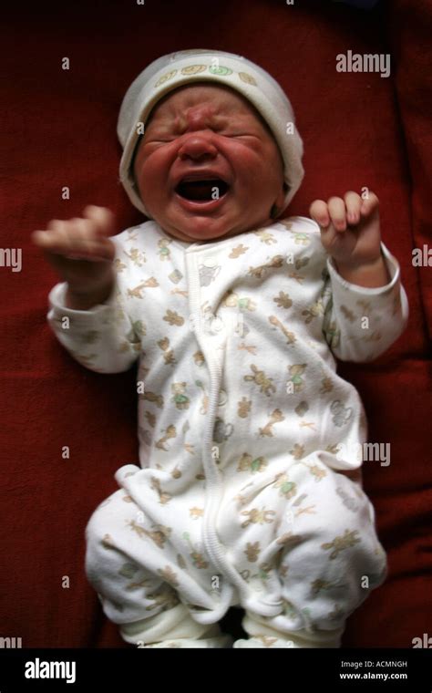 Baby newborn crying lying sad scream cry screaming frightened distressed hi-res stock ...