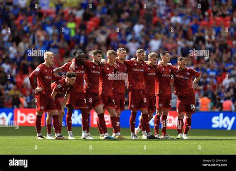 Carlisle United players during the penalty shoot out in the Sky Bet League Two play-off final at ...