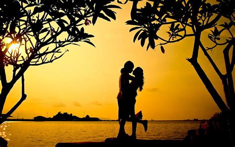 1366x768px | free download | HD wallpaper: Sunset Hug Love Couple, silhouette of man and woman ...