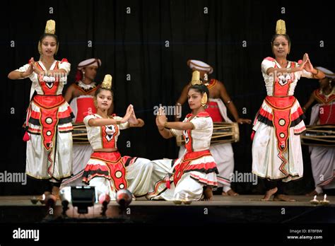 Kandyan dancers in costumes performing on stage in Kandy, Sri Lanka Stock Photo - Alamy