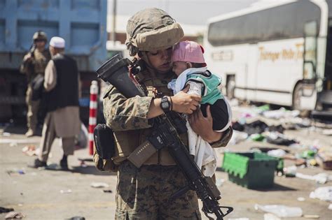 Photos of Afghanistan kids in US cargo plane, over Kabul wall go viral