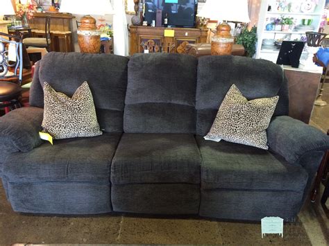 This super comfy double reclining sofa is in EXCELLENT condition! This ...