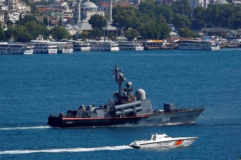 Russian tarantul class missile corvette ivanovets being escorted by a Turkish coast guard speed ...