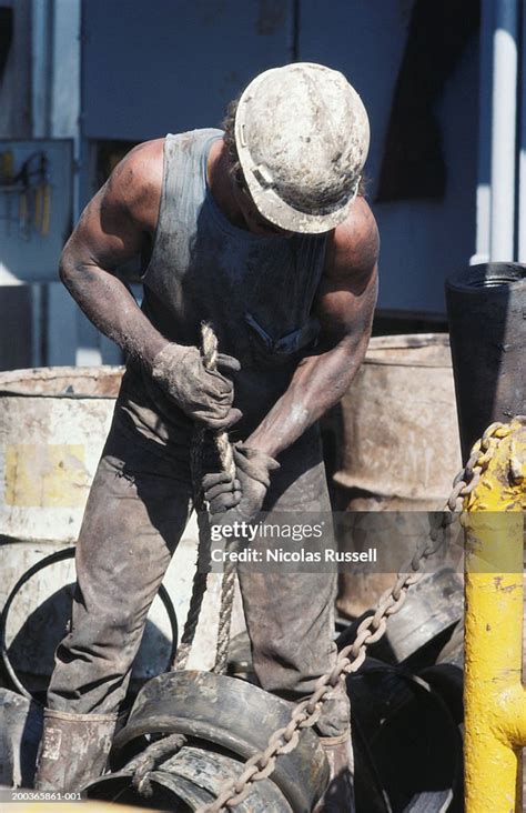 Oil Rig Roughneck Stacking Rope High-Res Stock Photo - Getty Images