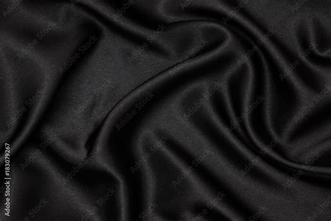 Black fabric texture background. Smooth elegant black silk can use as wedding background. Stock ...