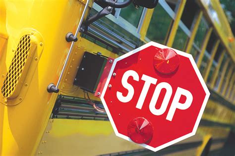 You shall not pass: a B.C. school bus with its red lights flashing - Kelowna Capital News