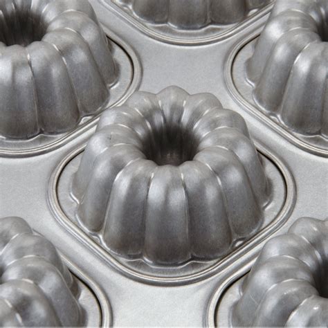 Chicago Metallic 43055 Glazed Aluminized Steel 15 Mold Mini Fluted 7.5 oz. Tube Cake Pan - 17 7/ ...