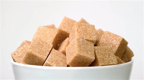 Brown Sugar Cubes In Bowl - Stock Video | Motion Array