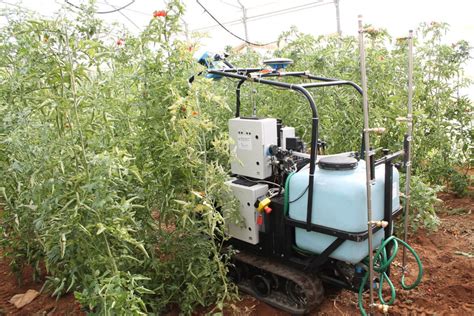 The developed spraying robot while operating in a greenhouse. | Download Scientific Diagram