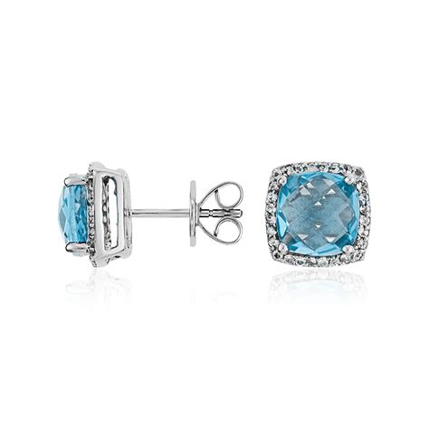 Blue Topaz Halo Stud Earrings in Sterling Silver (8x8mm) | Blue Nile