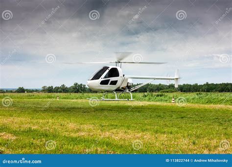 Landing a Small Helicopter in the Field Stock Photo - Image of rotor, small: 113822744