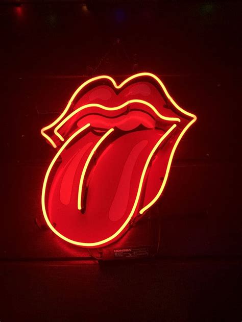 Download Neon Orange Aesthetic Rolling Stones Logo Wallpaper | Wallpapers.com