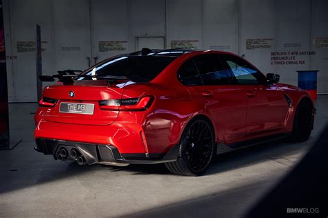 BMW M3 in Toronto Red and featuring carbon fiber accessories