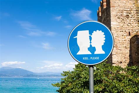 Kiss Street Sign Located in Public Area in Front of Sirmione Castle, Italy. Concept of Love ...