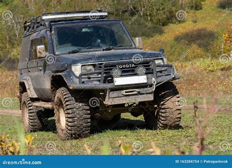 Toyota Land Cruiser Prado Off-road Expedition Truck on Autumn Forest ...