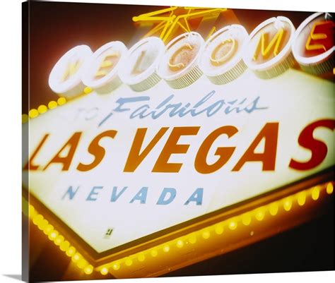 Low angle view of a welcome sign lit up at night, Las Vegas, Nevada Wall Art, Canvas Prints ...