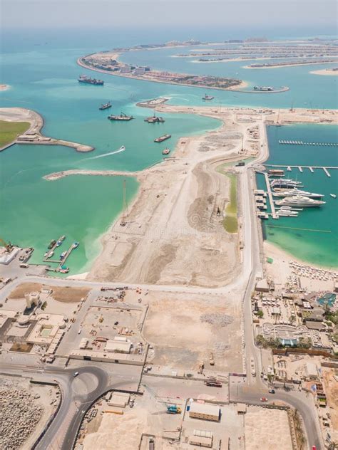 Construction of an Artificial Island Palm Jumeirah with Construction Equipment in Dubai. Stock ...