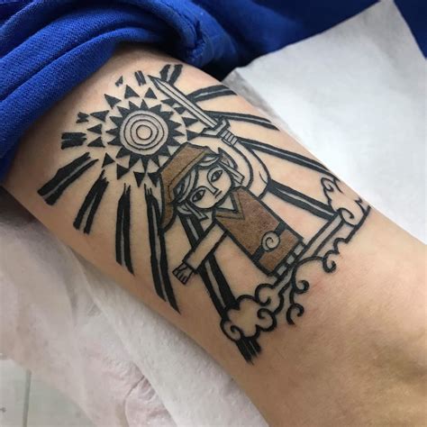 wind waker tattoo I got today! Color is off because of blood dont mind it : r/zelda