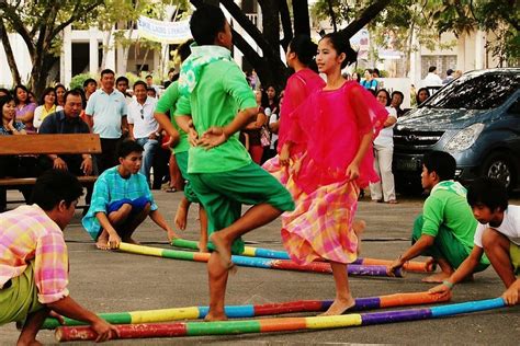 Tinikling: Dodging bamboo traps while performing the Filipino folk dance | by Jeanylyn Lopez ...