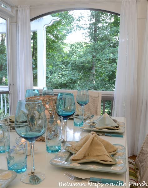 A Beach Themed Table Setting with a Starfish Napkin Fold