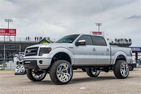 Sleek Ford F150 With a Lift and Chrome Off-road Wheels by Fuel — CARiD ...