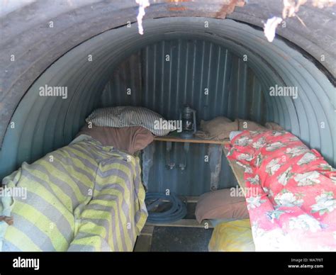 Interior view of an Anderson Shelter with sleeping bags for family accommodation during bomb ...