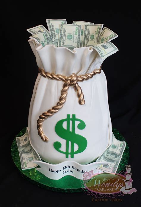 a money bag cake that is on top of a plate