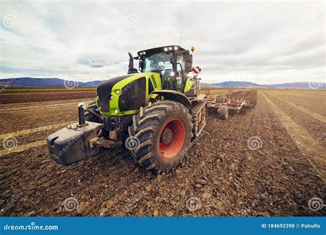 Modern Tractor Working on the Farm, a Modern Agricultural Transport ...