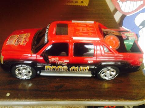 G219 Toy Cadillac Escalade that moves and makes noise - Rubber City Auctions in Akron Ohio