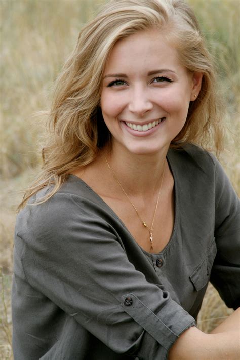 Woman in Black Scoop Neck Shirt Smiling · Free Stock Photo