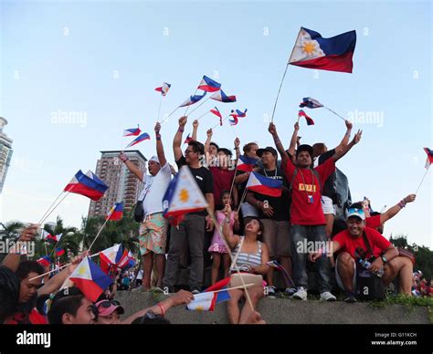 Manila, Philippines. 07th May, 2016. Filipinos waving their flags ...