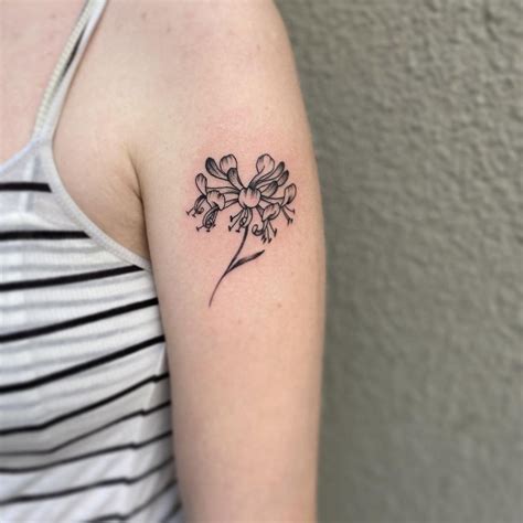 The Enchanting Honeysuckle Tattoo Meaning: A Blossoming Symbol of Beauty and Love