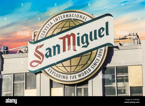 Logo of San Miguel Spain beer brewery banner on building Stock Photo - Alamy