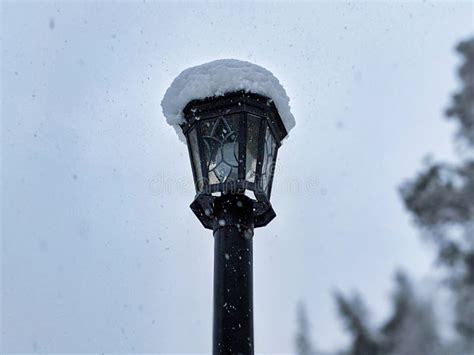 A lamp post in the snow stock image. Image of white, cold - 12557239