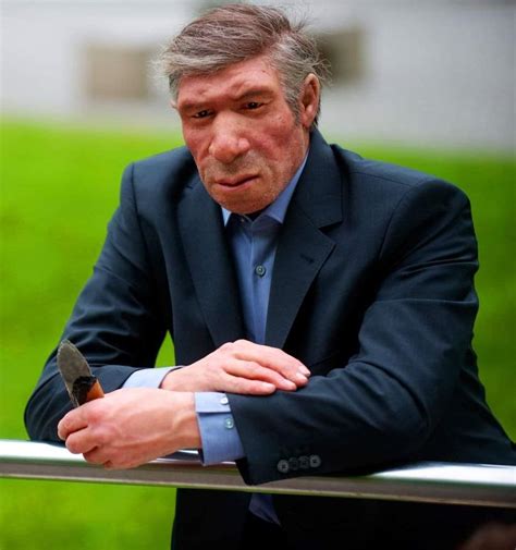 A model of a Neanderthal man in modern clothing; Stands in front of Neanderthal Museum in ...