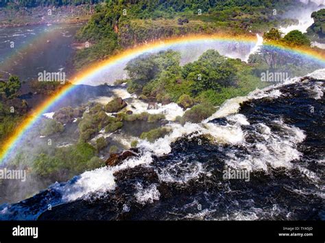 Iguazu Falls with a Rainbow Stock Photo - Alamy