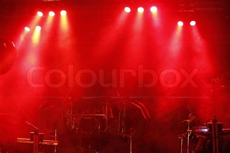 Red stage light at outdoor concert | Stock image | Colourbox