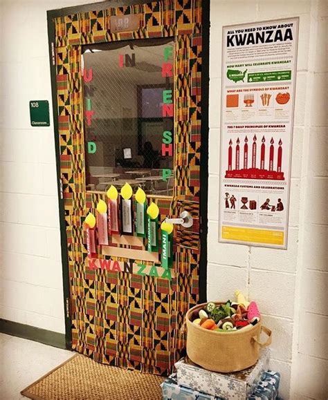 Our Kwanzaa door decoration including a straw mat and basket of fruit representing the first har ...