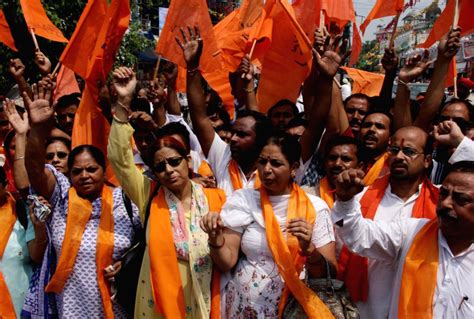 Vishwa Hindu Parishad activist staging protest against UP government ...