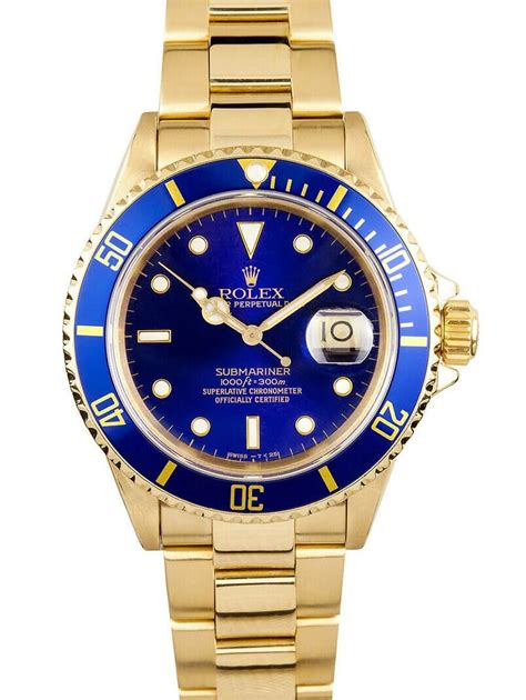 Rolex Submariner Blue Dial 18k Yellow Gold 16618 | Zaeger Diamonds And Watches