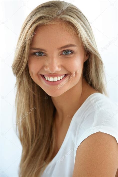 Beauty Woman Portrait. Girl With Beautiful Face Smiling Stock Photo by ©puhhha 120485602