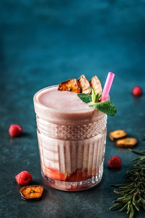 Milk Smoothie Strawberry, Banana, Raspberries in Glass on Dark Blue Background. Summer Cold ...