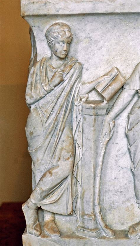 Calliope, muse of epic poetry, holding a volumen. | Louvre, Roman art, Greek sculpture